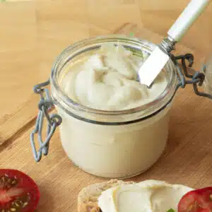 A pot of cream cheese made with cashews ready to eat.