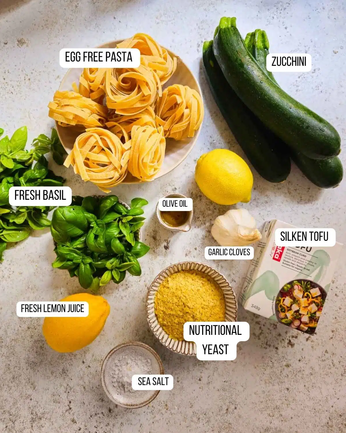 Ingredients for the creamy zucchini lemon basil pasta laid out.