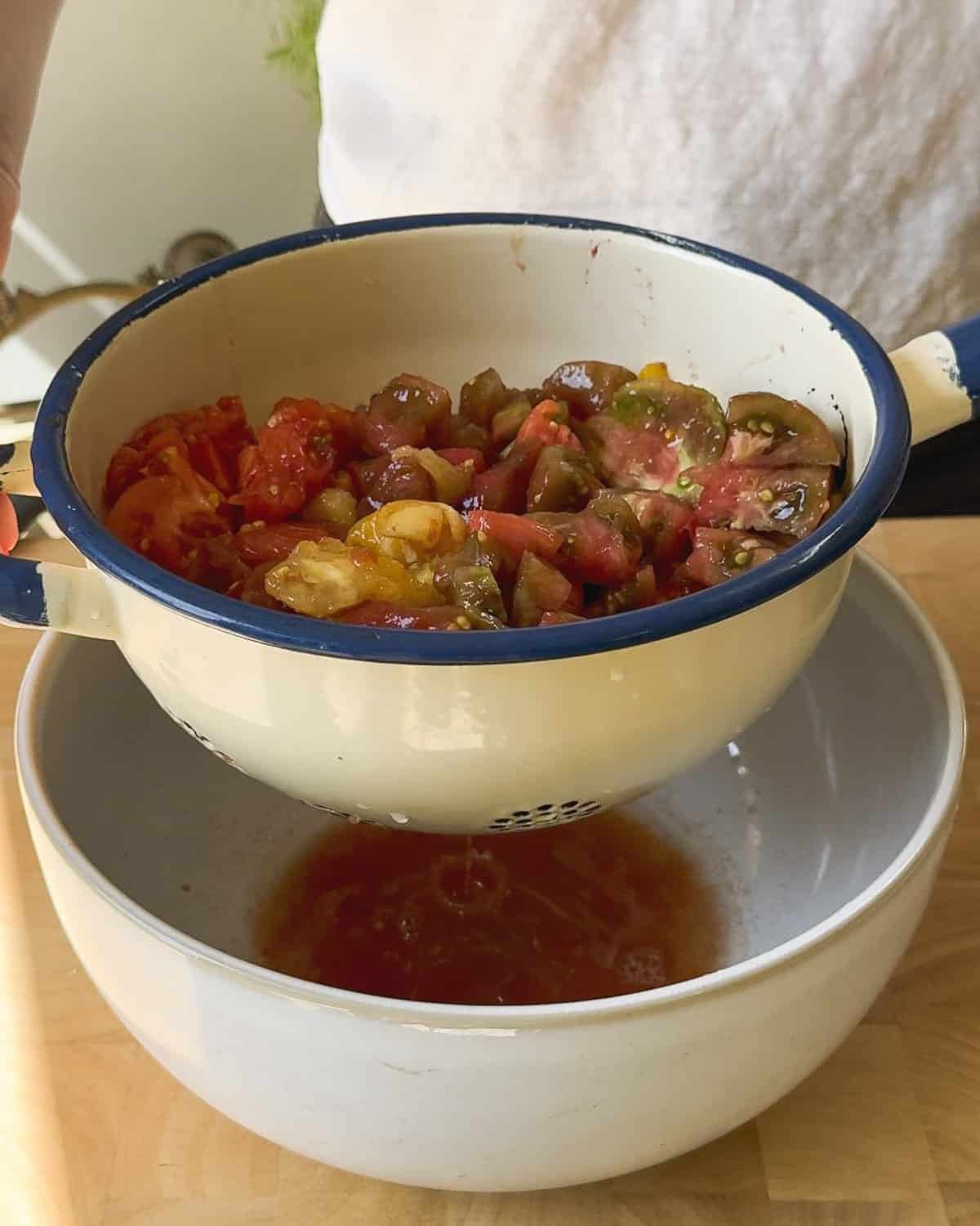 Roughly chop the tomatoes, leave in a colander to drain off excess water.