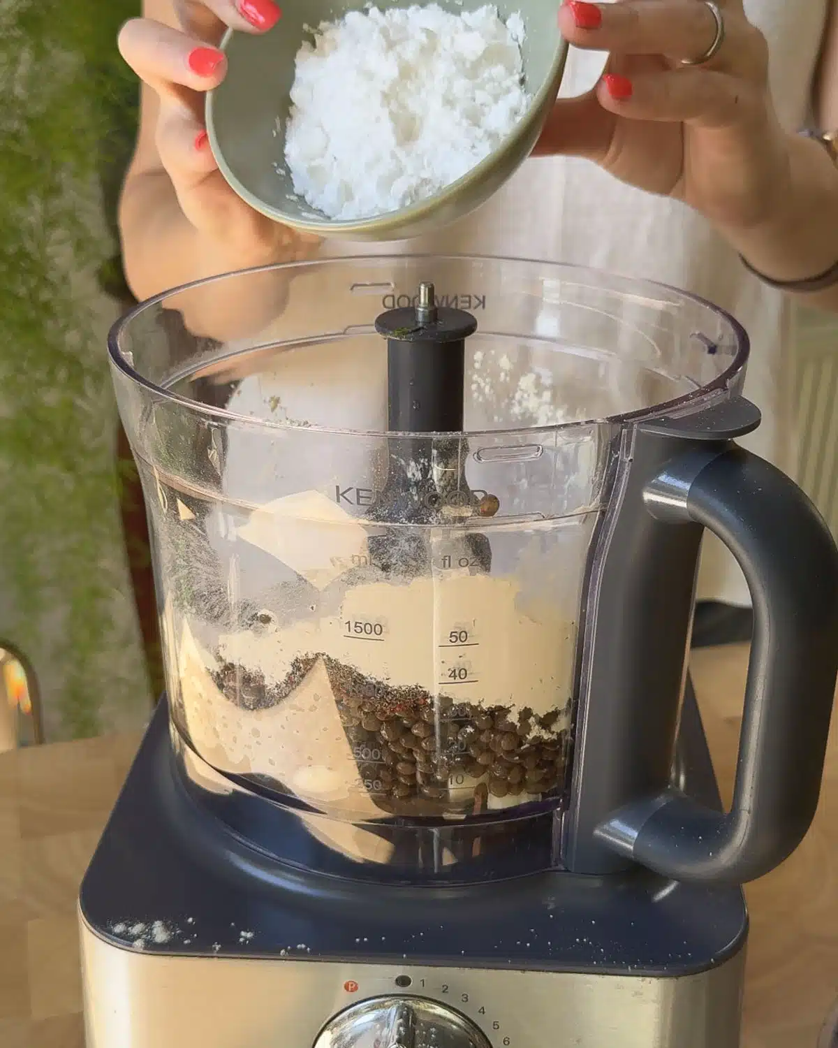 Add the cooked lentils, garlic, flours, seasonings and baked eggplant to a blender.