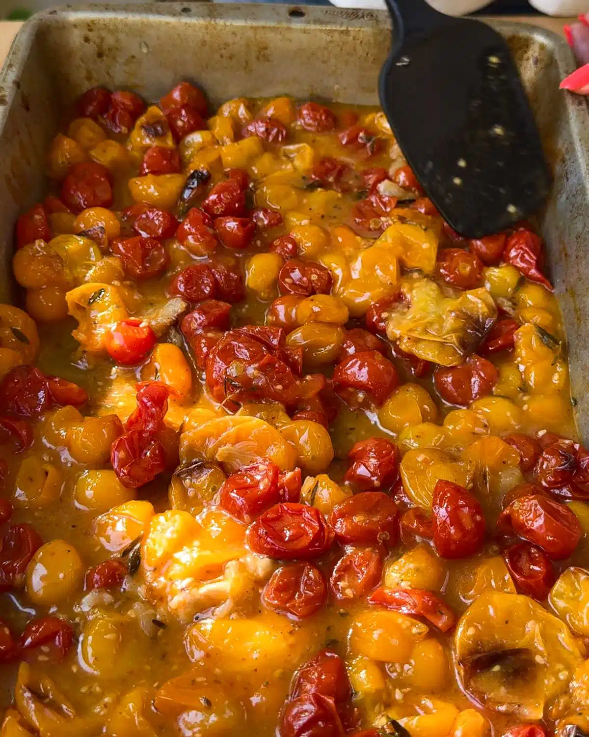 Mix the garlic into the tomatoes, bursting some. Alternatively blend.