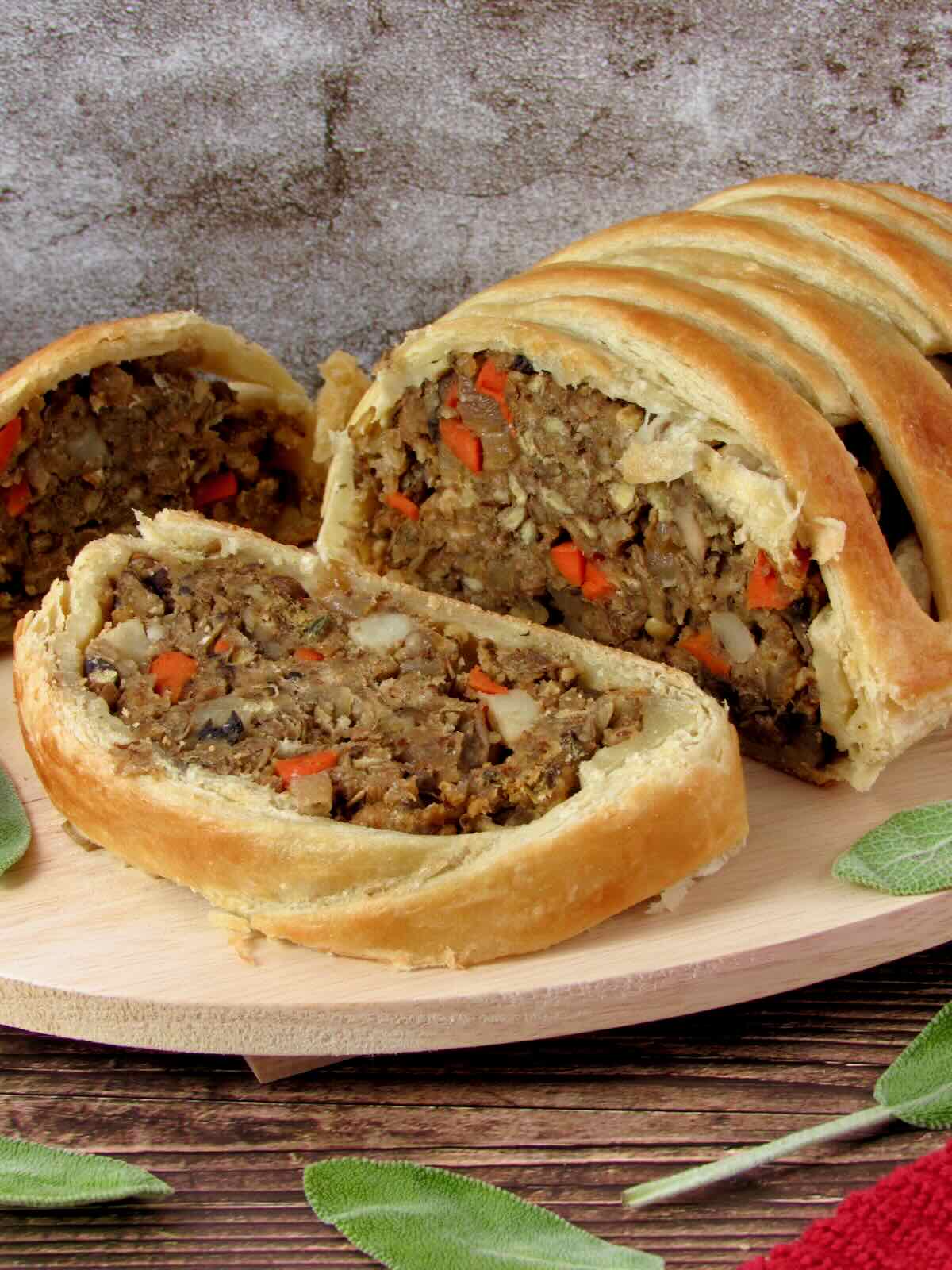 Veggie Wellington with a slice taken out of it.
