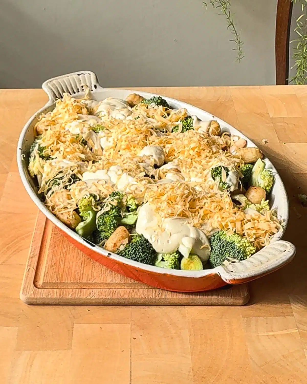 Sprinkle over the grated cheese and return to the oven to bake.