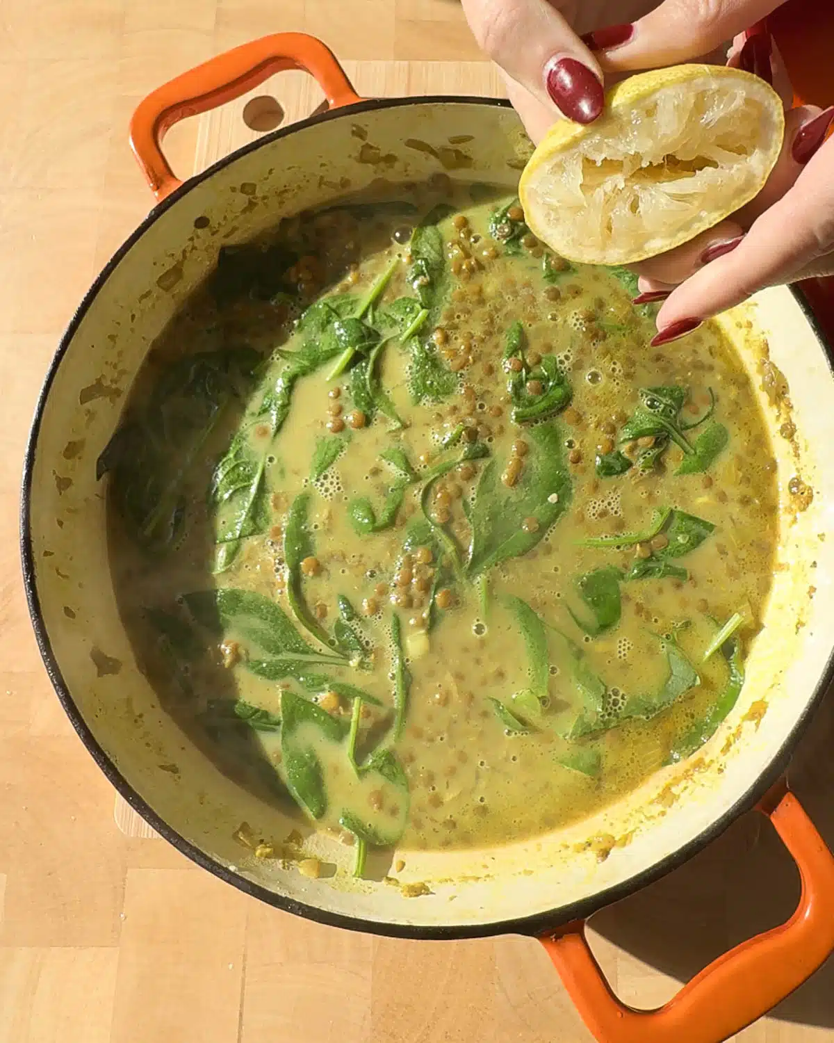 Finish the soup off with lemon juice and optional coriander leaf.